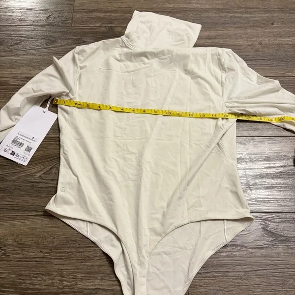 NWT Lululemon Wundermost Ultra-Soft Nulu Turtleneck Bodysuit (Bone) Size Large - Picture 7 of 7